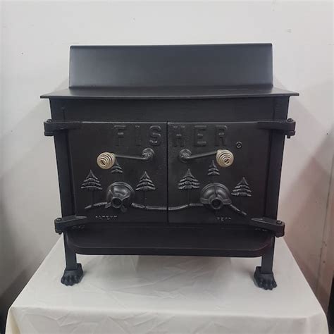 24 square inch opening) This is about 2 inches from the top, all the way across any model Fisher Stove. . Fisher grandpa bear wood stove